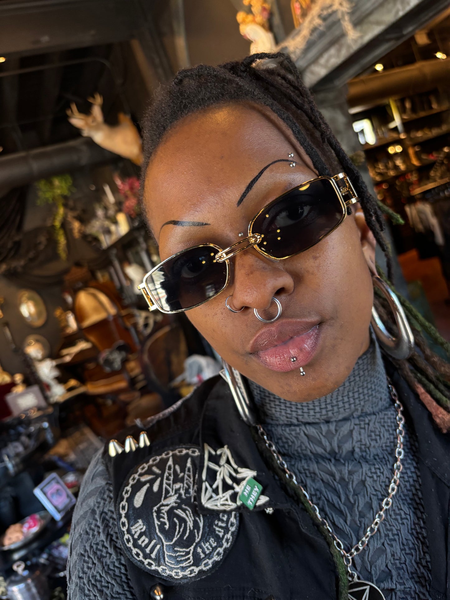 Oval “wire” framed sunglasses