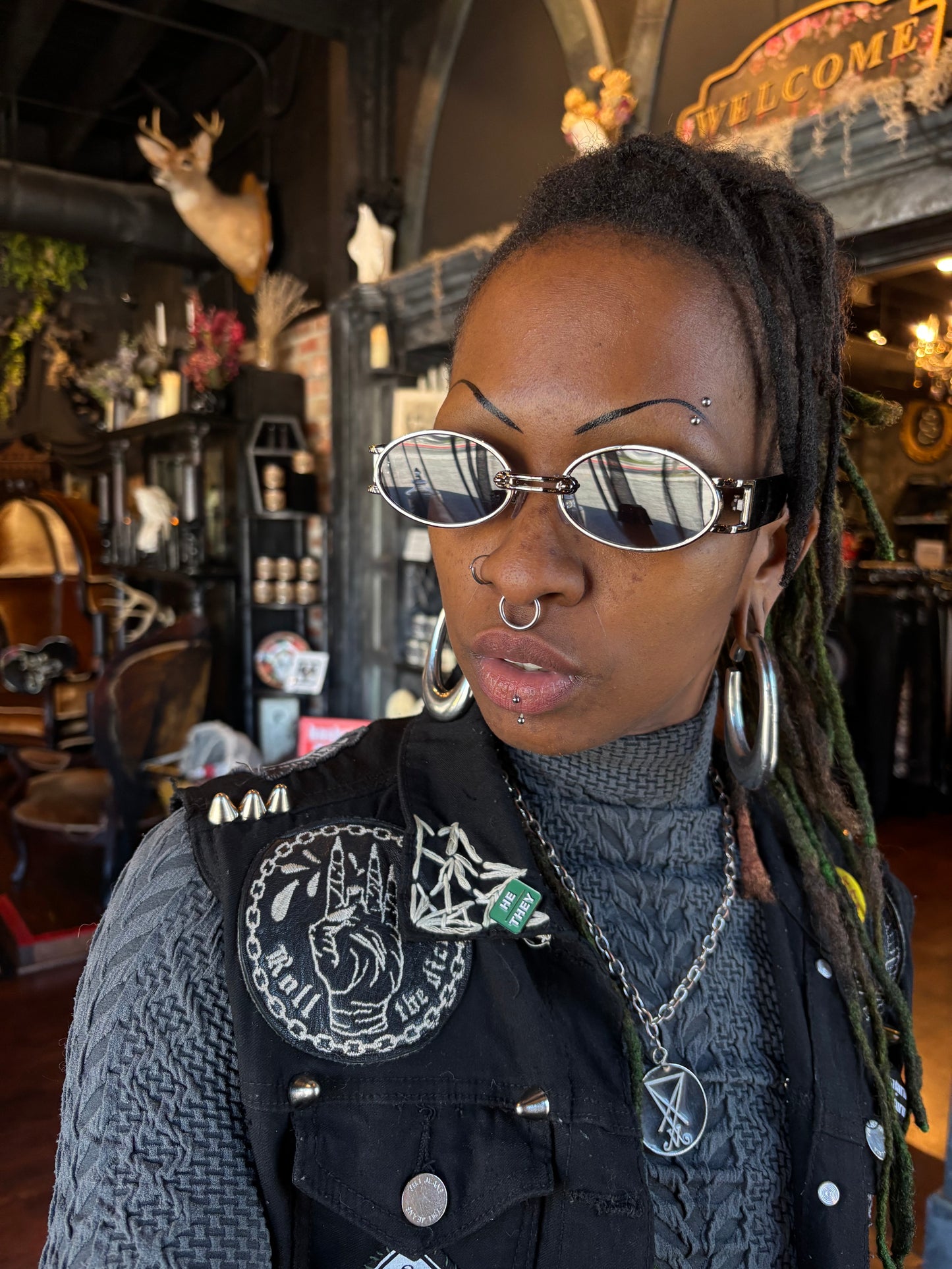 Oval “wire” framed sunglasses