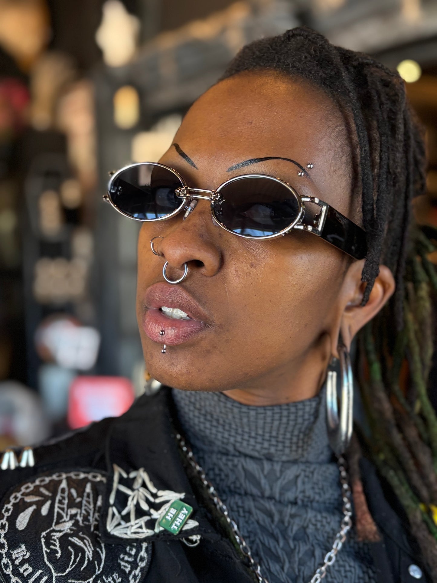 Oval “wire” framed sunglasses