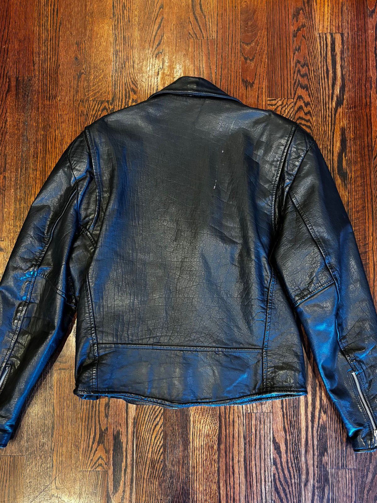 Wilson’s Leather Moto Jacket with Studded Turquoise Details ￼