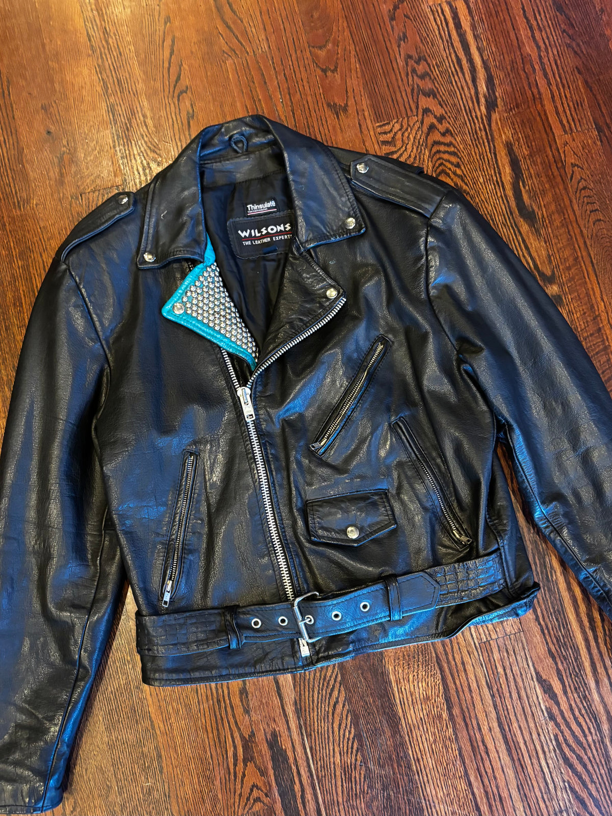 Wilson’s Leather Moto Jacket with Studded Turquoise Details ￼