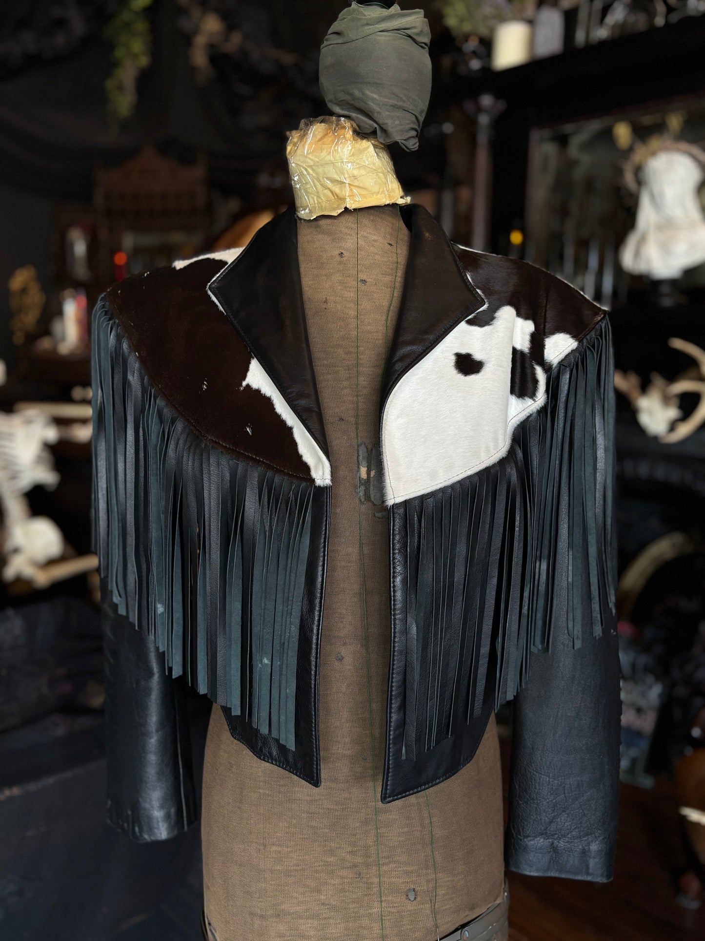 Vintage Continental Cowhide And Black Leather Fringed