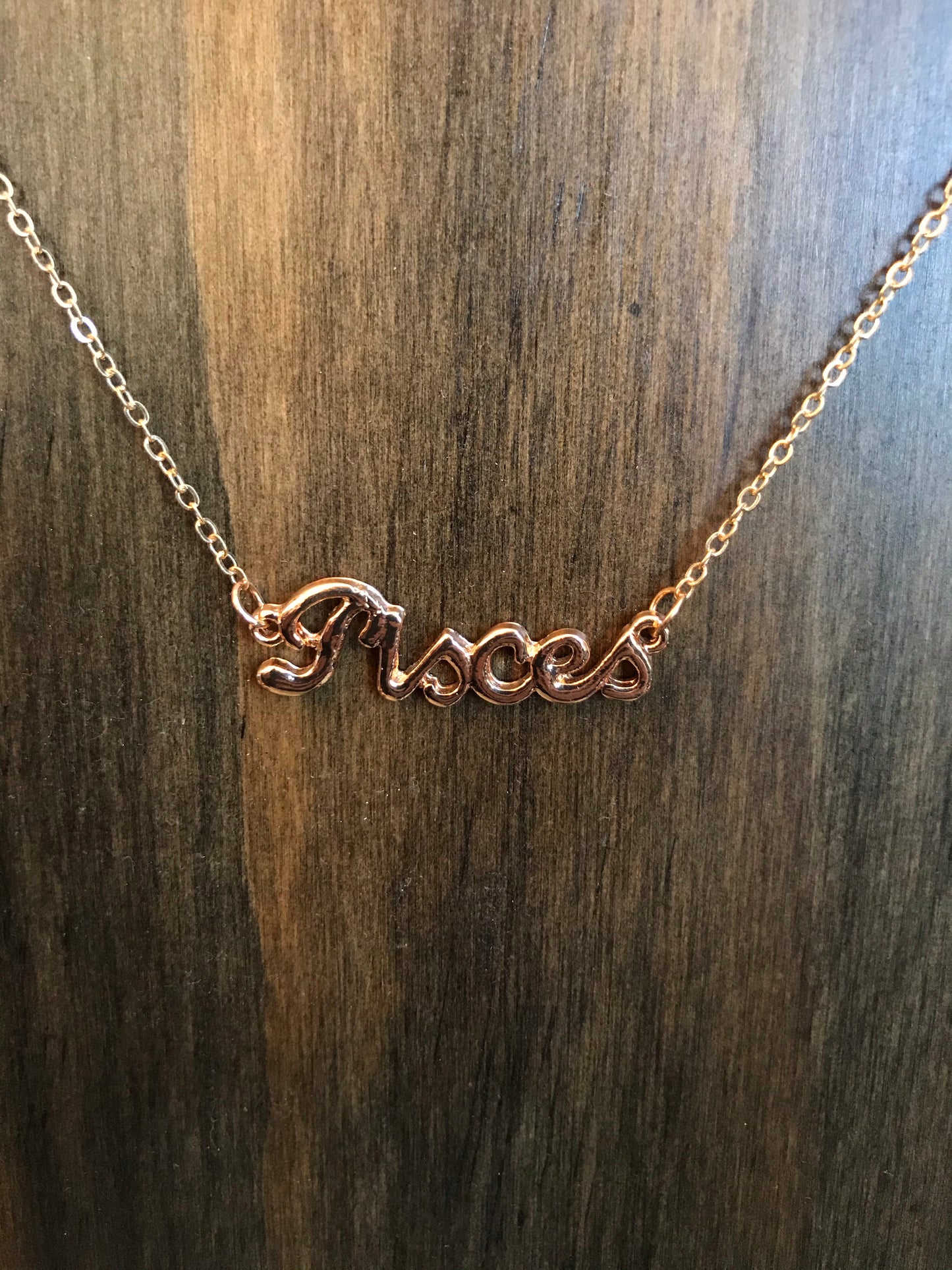 Gold Tone Pisces Necklace