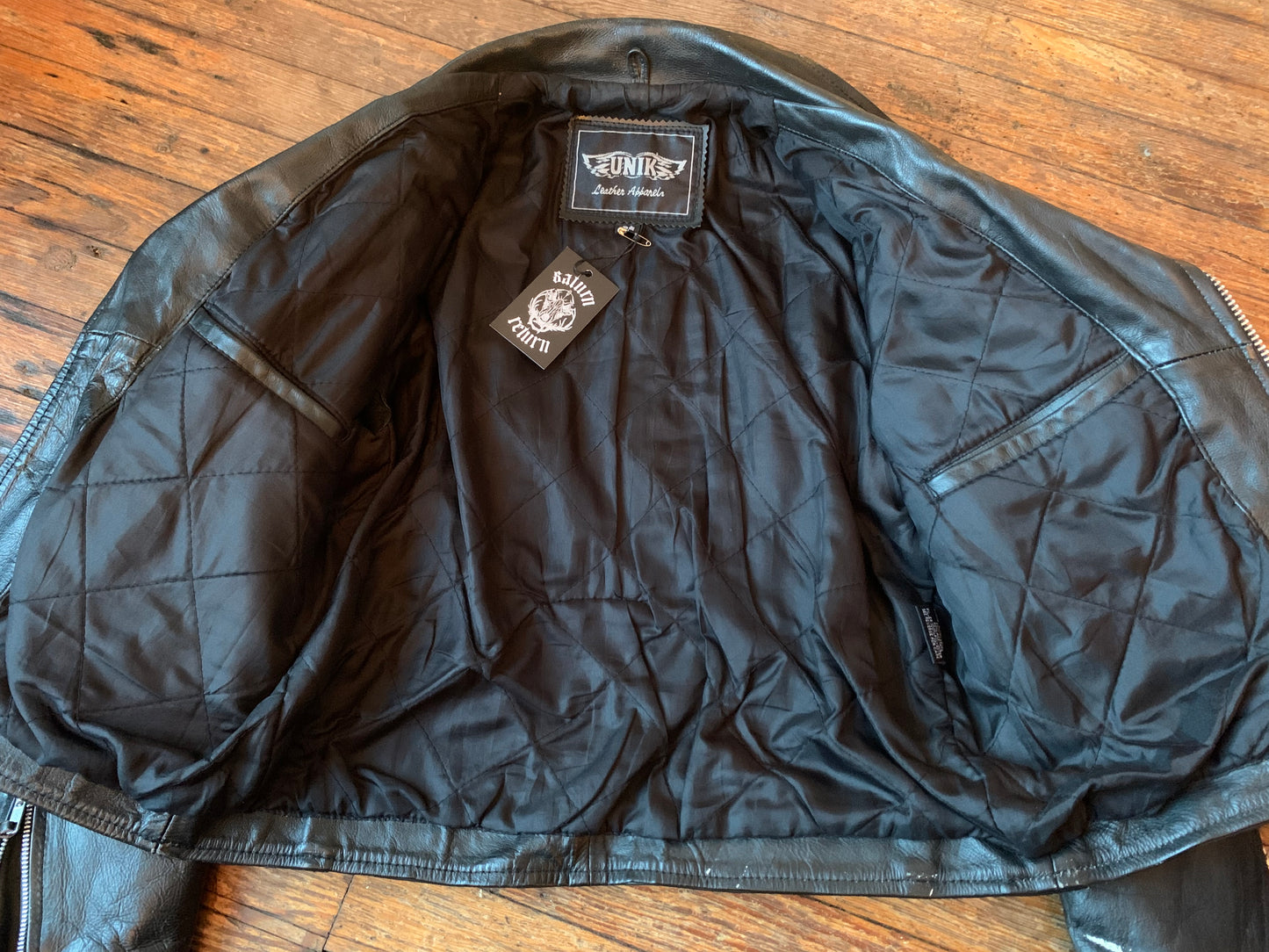 Unik Worn In Black Leather Motorcycle Jacket
