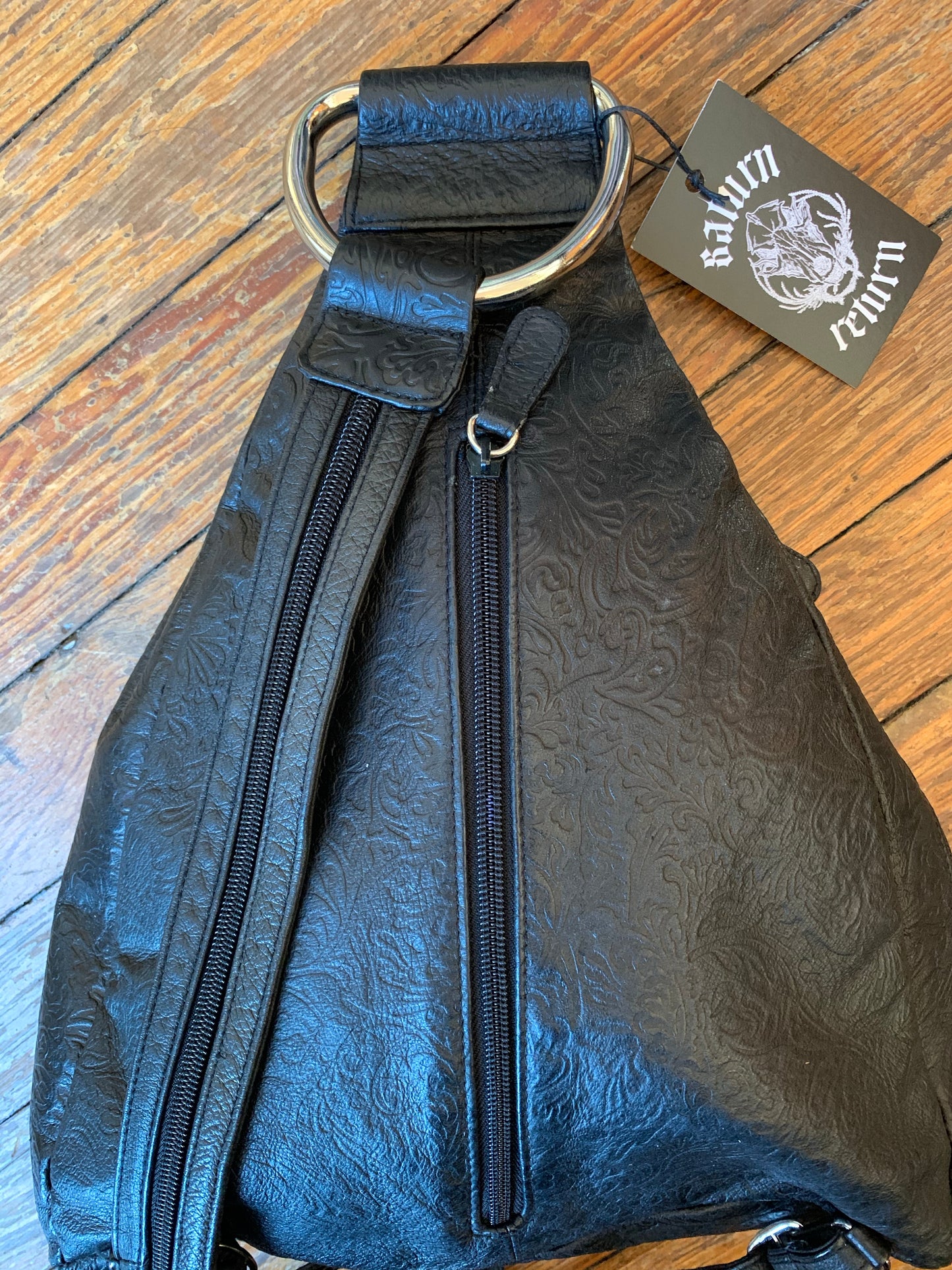 Black Embossed Leather D-Ring Backpack