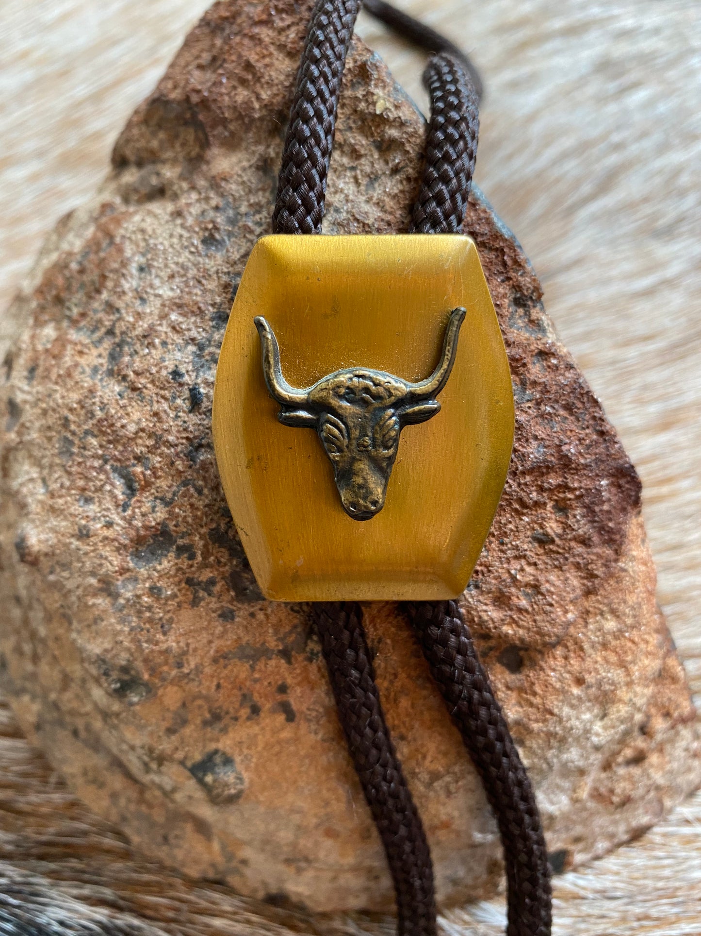 Bronze/Gold Bull Head Pendant w/Brown Cord Bolo Tie